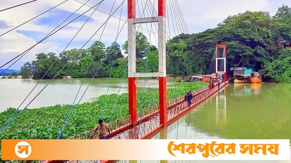 পানিতে ডুবে গেছে রাঙামাটির ঝুলন্ত সেতু