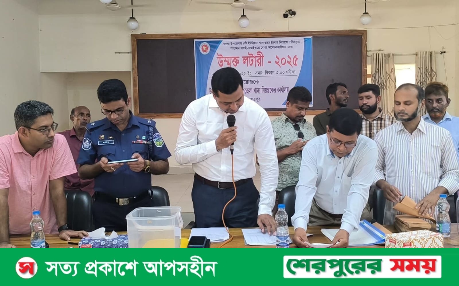 নকলায় খাদ্যবান্ধব কর্মসূচির ডিলার নিয়োগ ও পূজামন্ডপে জি.আর’র চাল বিতরণ